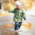pigeon-forge-child-splashing-puddle-autumn