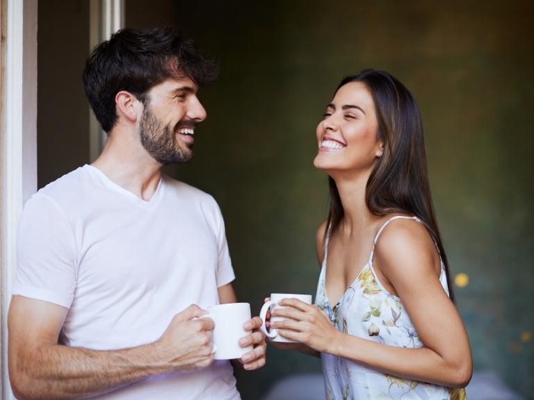 pigeon-forge-couple-laughing-drinking-coffee