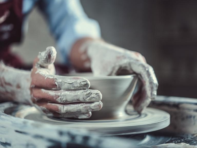 pigeon-forge-hands-making-pottery