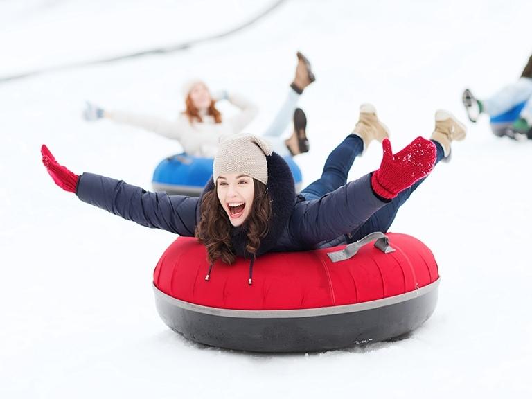 pigeon-forge-girl-snow-tubing