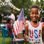 pigeon-forge-child=holding-usa-flag