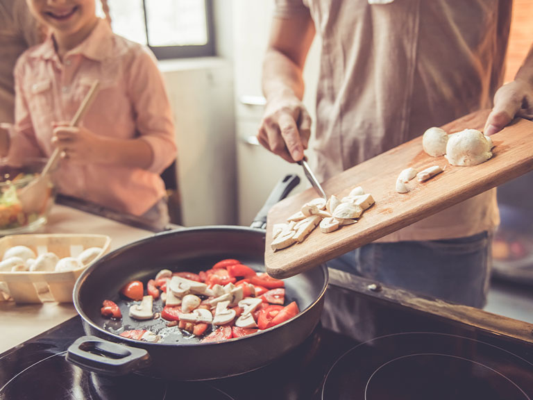 family-cooking-together-in-kitchen