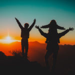 family-mountain-top-dark