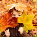 kid-fall-leaves